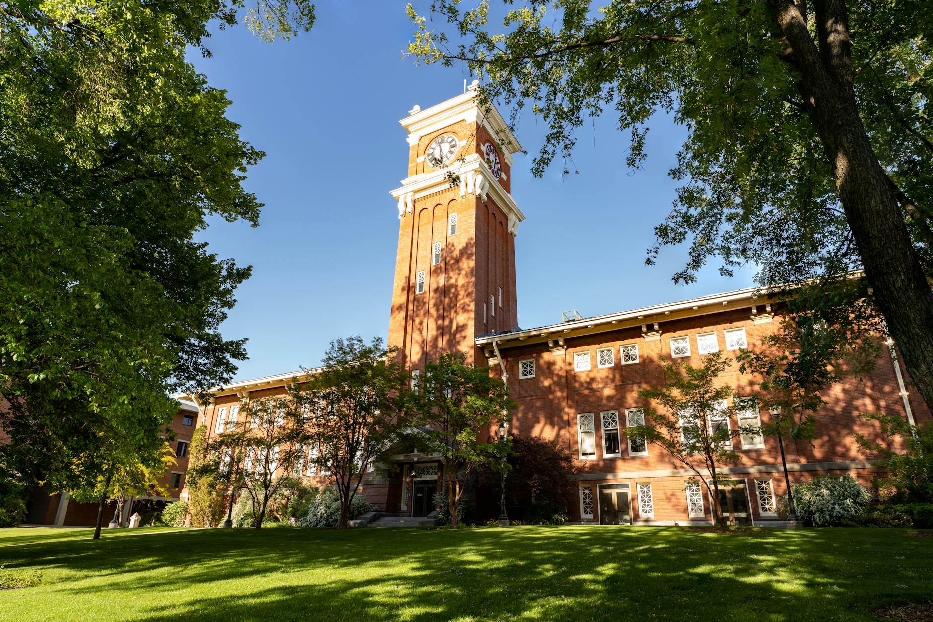 Students and alumni gather near a university campus as Kentucky State University faces a federal lawsuit over a state-mandated restructuring plan.