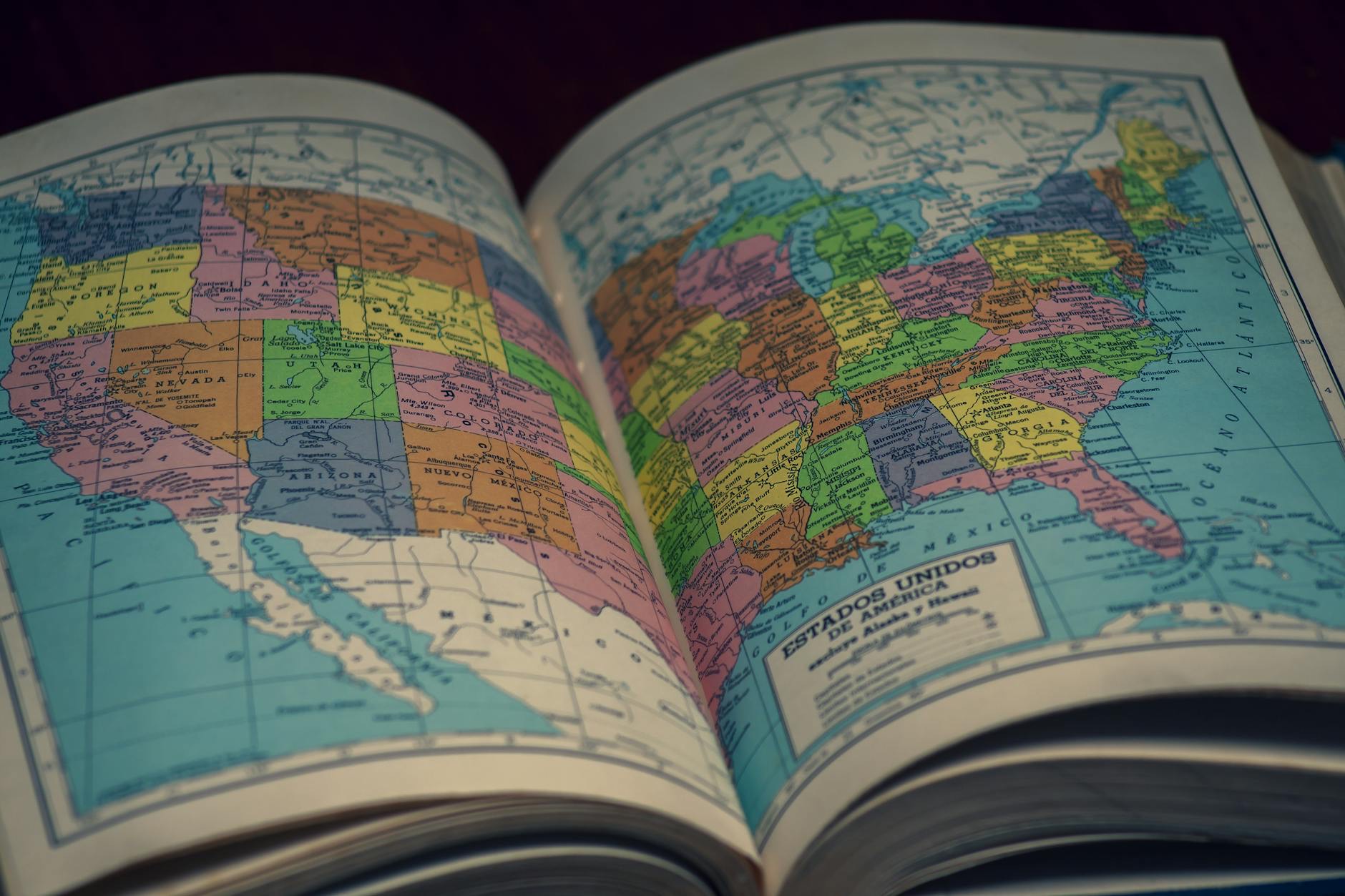 A U.S. map highlighting variations in student loan debt across states alongside college students on campus.