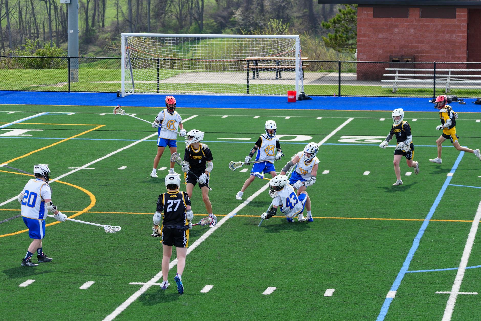 NCAA Lacrosse First Round Reshapes Quarterfinal Field With ACC Upsets and Record Day 1 College lacrosse players compete during an NCAA tournament game as teams battle for a quarterfinal berth.