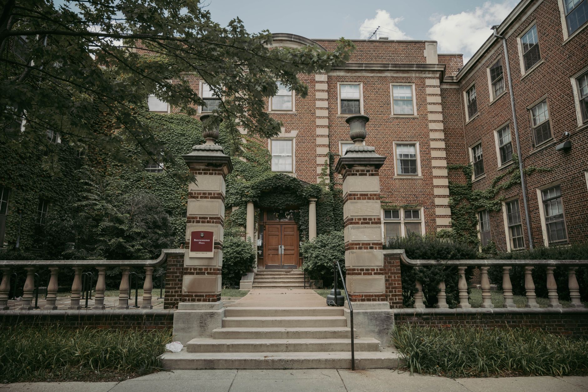 Students walk across Howard University’s Washington campus as incoming families seek answers about enrollment and tuition requirements.