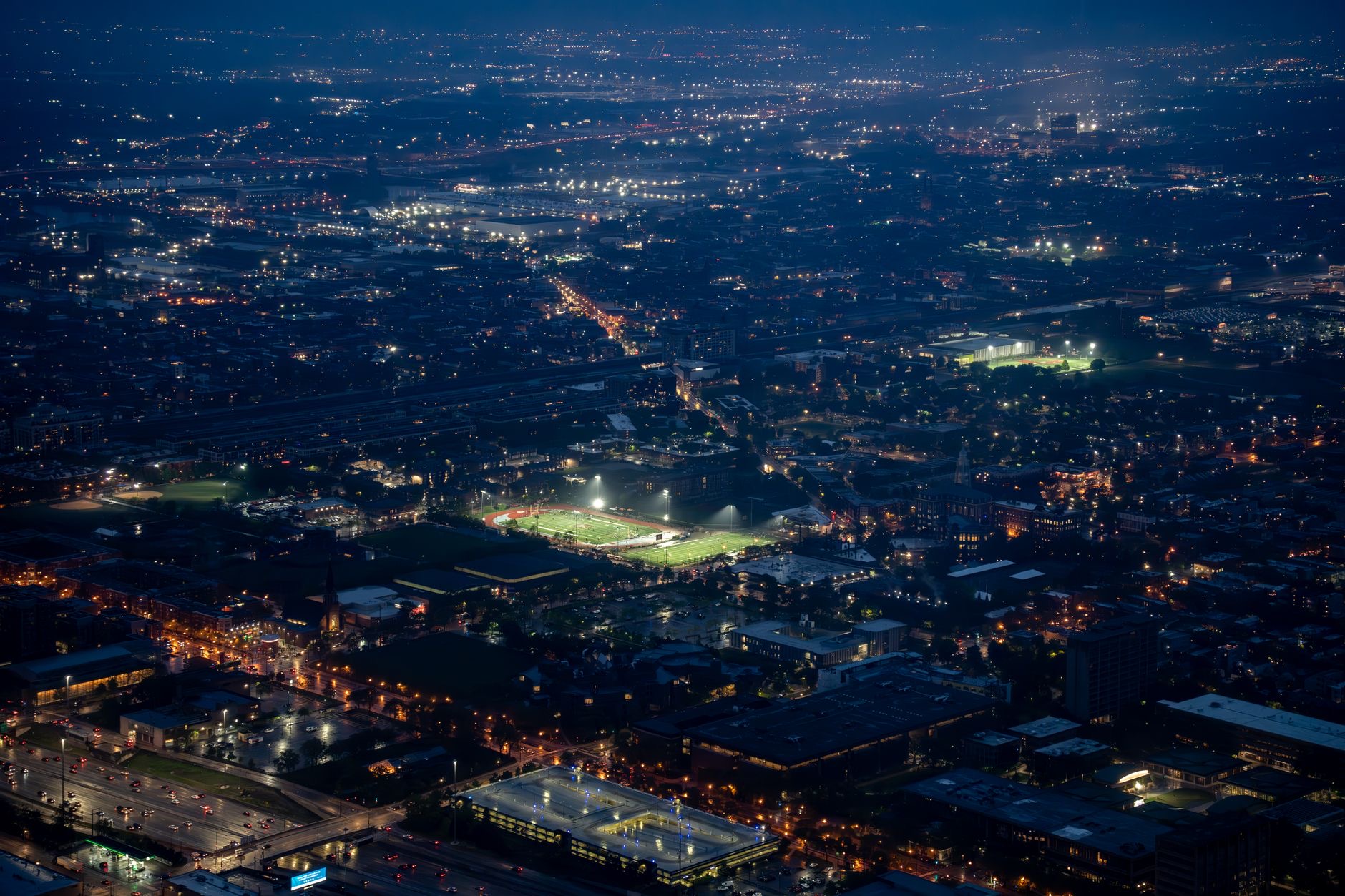 A panoramic college football stadium represents Sporting News’ All-America selections spanning seven decades of the sport.